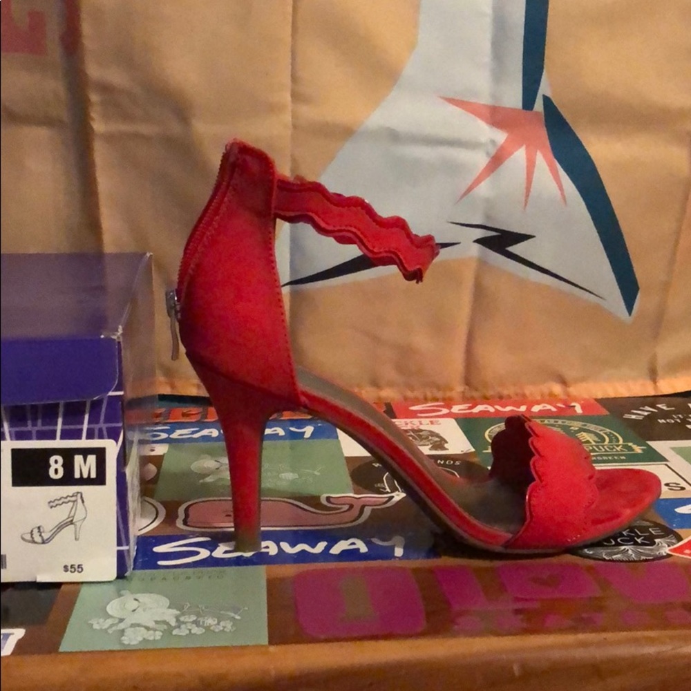 Size 8 women. red heels, only worn twice